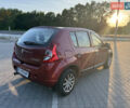 Рено Сандеро 2011 в Львове на Automoto.ua Красный Рено Сандеро, объемом двигателя 1.39 л и пробегом 252 тыс. км за 3700 $, фото 4 на Automoto.ua