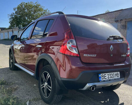 Красный Рено Сандеро, объемом двигателя 1.6 л и пробегом 113 тыс. км за 7800 $, фото 6 на Automoto.ua