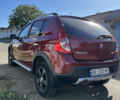 Красный Рено Сандеро, объемом двигателя 1.6 л и пробегом 113 тыс. км за 7800 $, фото 6 на Automoto.ua