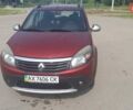 Красный Рено Сандеро, объемом двигателя 1.6 л и пробегом 185 тыс. км за 6200 $, фото 1 на Automoto.ua