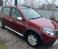 Красный Рено Сандеро, объемом двигателя 1.6 л и пробегом 177 тыс. км за 5500 $, фото 1 на Automoto.ua