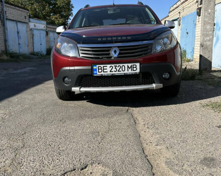 Красный Рено Сандеро, объемом двигателя 1.6 л и пробегом 113 тыс. км за 7800 $, фото 1 на Automoto.ua