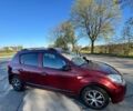 Красный Рено Сандеро, объемом двигателя 1.4 л и пробегом 102 тыс. км за 5600 $, фото 1 на Automoto.ua