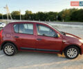 Рено Сандеро 2011 в Львове на Automoto.ua Красный Рено Сандеро, объемом двигателя 1.39 л и пробегом 252 тыс. км за 3700 $, фото 3 на Automoto.ua