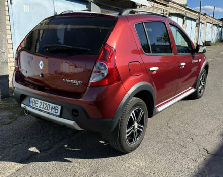 Красный Рено Сандеро, объемом двигателя 1.6 л и пробегом 113 тыс. км за 7800 $, фото 4 на Automoto.ua