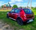 Красный Рено Сандеро, объемом двигателя 1.6 л и пробегом 203 тыс. км за 6600 $, фото 1 на Automoto.ua