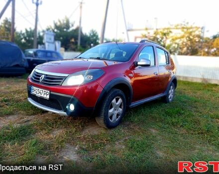 Красный Рено Сандеро, объемом двигателя 1.6 л и пробегом 250 тыс. км за 4800 $, фото 12 на Automoto.ua