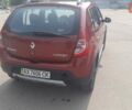 Красный Рено Сандеро, объемом двигателя 1.6 л и пробегом 185 тыс. км за 6200 $, фото 1 на Automoto.ua