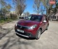 Красный Рено Сандеро, объемом двигателя 1.6 л и пробегом 136 тыс. км за 6900 $, фото 1 на Automoto.ua