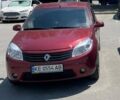 Красный Рено Сандеро, объемом двигателя 1.6 л и пробегом 140 тыс. км за 6000 $, фото 1 на Automoto.ua
