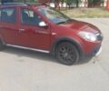 Красный Рено Сандеро, объемом двигателя 1.6 л и пробегом 185 тыс. км за 6200 $, фото 3 на Automoto.ua