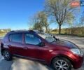Красный Рено Сандеро, объемом двигателя 1.39 л и пробегом 102 тыс. км за 5800 $, фото 1 на Automoto.ua