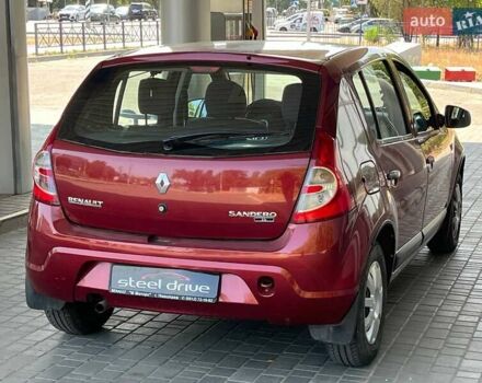 Красный Рено Сандеро, объемом двигателя 1.39 л и пробегом 97 тыс. км за 6199 $, фото 4 на Automoto.ua
