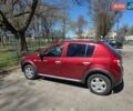 Красный Рено Сандеро, объемом двигателя 1.6 л и пробегом 136 тыс. км за 7500 $, фото 2 на Automoto.ua