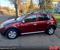 Червоний Рено Сандеро, об'ємом двигуна 1.6 л та пробігом 160 тис. км за 6500 $, фото 1 на Automoto.ua