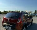 Красный Рено Сандеро, объемом двигателя 1.6 л и пробегом 125 тыс. км за 6750 $, фото 7 на Automoto.ua