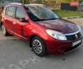 Красный Рено Сандеро, объемом двигателя 1.6 л и пробегом 160 тыс. км за 5900 $, фото 1 на Automoto.ua