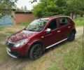 Червоний Рено Сандеро, об'ємом двигуна 1.6 л та пробігом 203 тис. км за 6300 $, фото 26 на Automoto.ua