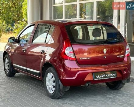 Красный Рено Сандеро, объемом двигателя 1.39 л и пробегом 97 тыс. км за 6199 $, фото 5 на Automoto.ua