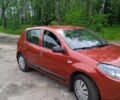 Красный Рено Сандеро, объемом двигателя 1.4 л и пробегом 190 тыс. км за 4750 $, фото 2 на Automoto.ua