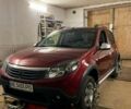 Красный Рено Сандеро, объемом двигателя 1.6 л и пробегом 115 тыс. км за 9229 $, фото 1 на Automoto.ua