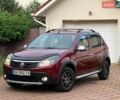 Червоний Рено Сандеро, об'ємом двигуна 1.6 л та пробігом 90 тис. км за 7999 $, фото 1 на Automoto.ua