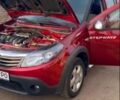 Красный Рено Сандеро, объемом двигателя 1.6 л и пробегом 115 тыс. км за 9229 $, фото 2 на Automoto.ua