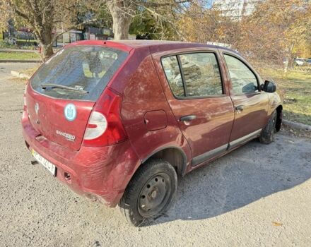 Красный Рено Сандеро, объемом двигателя 1.4 л и пробегом 150 тыс. км за 1500 $, фото 1 на Automoto.ua