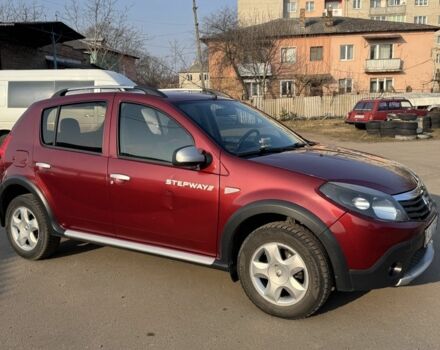 Красный Рено Сандеро, объемом двигателя 1.6 л и пробегом 76 тыс. км за 6800 $, фото 4 на Automoto.ua