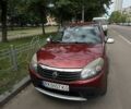 Червоний Рено Сандеро, об'ємом двигуна 1.6 л та пробігом 160 тис. км за 6200 $, фото 1 на Automoto.ua