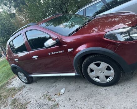 Красный Рено Сандеро, объемом двигателя 1.6 л и пробегом 98 тыс. км за 7100 $, фото 1 на Automoto.ua