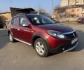 Красный Рено Сандеро, объемом двигателя 1.6 л и пробегом 76 тыс. км за 7000 $, фото 1 на Automoto.ua