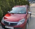 Красный Рено Сандеро, объемом двигателя 1.6 л и пробегом 163 тыс. км за 6500 $, фото 1 на Automoto.ua