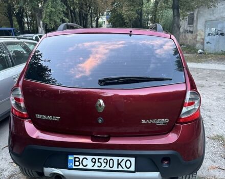 Красный Рено Сандеро, объемом двигателя 1.6 л и пробегом 98 тыс. км за 7100 $, фото 3 на Automoto.ua