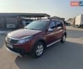 Червоний Рено Сандеро, об'ємом двигуна 1.6 л та пробігом 72 тис. км за 7500 $, фото 1 на Automoto.ua