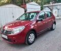 Красный Рено Сандеро, объемом двигателя 1.4 л и пробегом 157 тыс. км за 4200 $, фото 1 на Automoto.ua