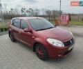 Красный Рено Сандеро, объемом двигателя 1.6 л и пробегом 170 тыс. км за 5999 $, фото 1 на Automoto.ua
