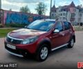 Красный Рено Сандеро, объемом двигателя 1.6 л и пробегом 104 тыс. км за 6850 $, фото 1 на Automoto.ua