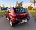 Красный Рено Сандеро, объемом двигателя 1.6 л и пробегом 153 тыс. км за 6900 $, фото 7 на Automoto.ua