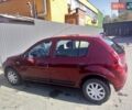 Красный Рено Сандеро, объемом двигателя 1.39 л и пробегом 52 тыс. км за 7800 $, фото 1 на Automoto.ua