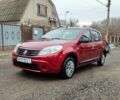 Красный Рено Сандеро, объемом двигателя 1.4 л и пробегом 178 тыс. км за 4850 $, фото 1 на Automoto.ua