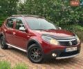 Червоний Рено Сандеро, об'ємом двигуна 1.6 л та пробігом 90 тис. км за 7999 $, фото 15 на Automoto.ua