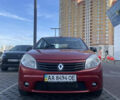 Червоний Рено Сандеро, об'ємом двигуна 1.39 л та пробігом 258 тис. км за 4900 $, фото 1 на Automoto.ua