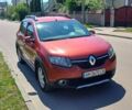 Красный Рено Сандеро, объемом двигателя 1.6 л и пробегом 73 тыс. км за 7400 $, фото 1 на Automoto.ua
