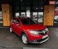 Красный Рено Сандеро, объемом двигателя 1.6 л и пробегом 206 тыс. км за 7299 $, фото 1 на Automoto.ua
