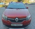 Червоний Рено Сандеро, об'ємом двигуна 1.6 л та пробігом 167 тис. км за 6500 $, фото 1 на Automoto.ua