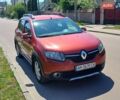Красный Рено Сандеро, объемом двигателя 1.6 л и пробегом 73 тыс. км за 8000 $, фото 1 на Automoto.ua