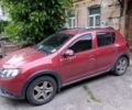 Красный Рено Сандеро, объемом двигателя 1.5 л и пробегом 140 тыс. км за 7035 $, фото 1 на Automoto.ua