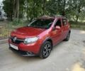 Красный Рено Сандеро, объемом двигателя 1.5 л и пробегом 219 тыс. км за 8033 $, фото 1 на Automoto.ua