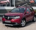Красный Рено Сандеро, объемом двигателя 1.46 л и пробегом 132 тыс. км за 7961 $, фото 1 на Automoto.ua